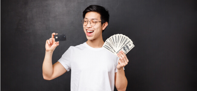 Happy asian guy become rich